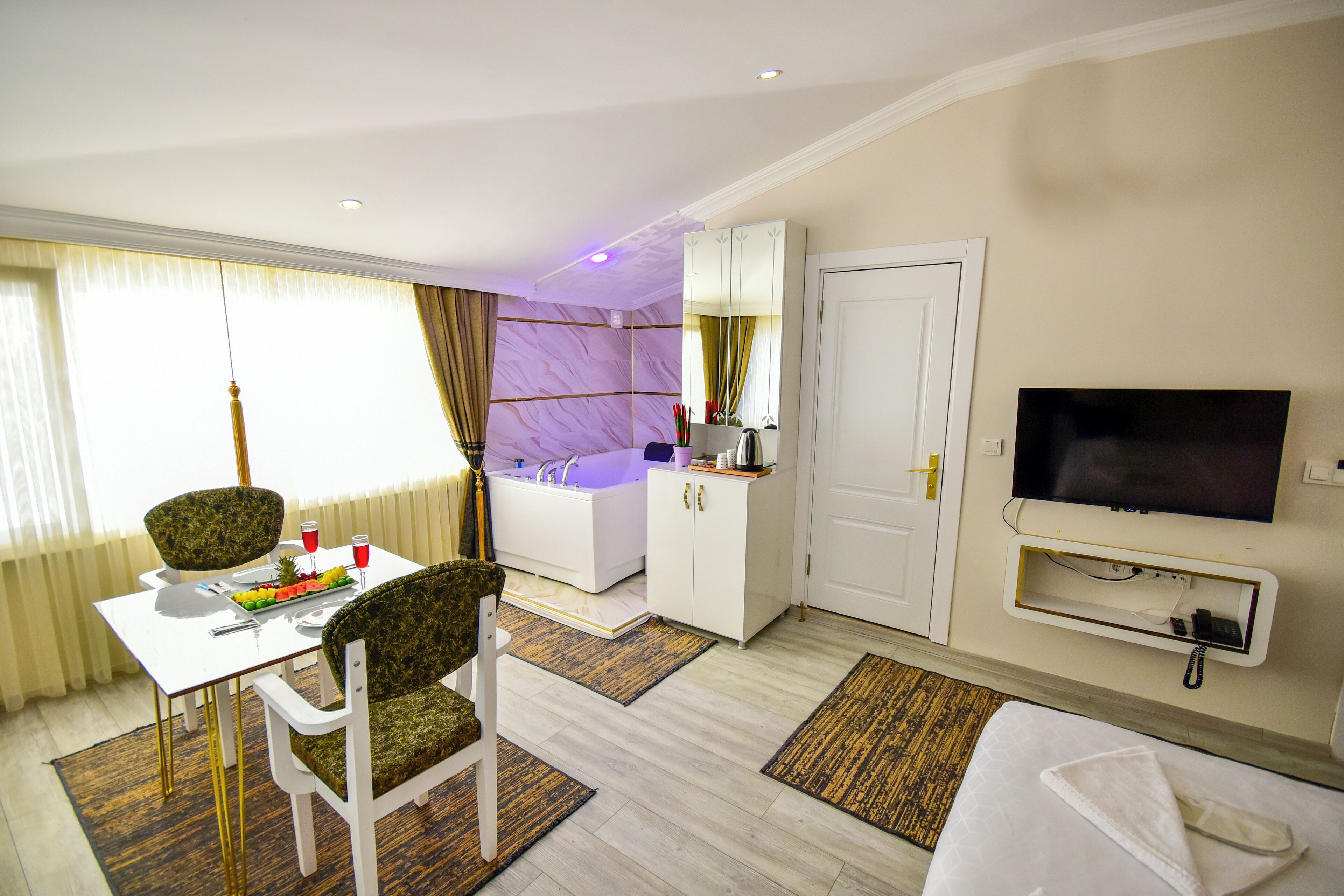 business studio suite | premium bedding, down duvets, minibar, individually decorated