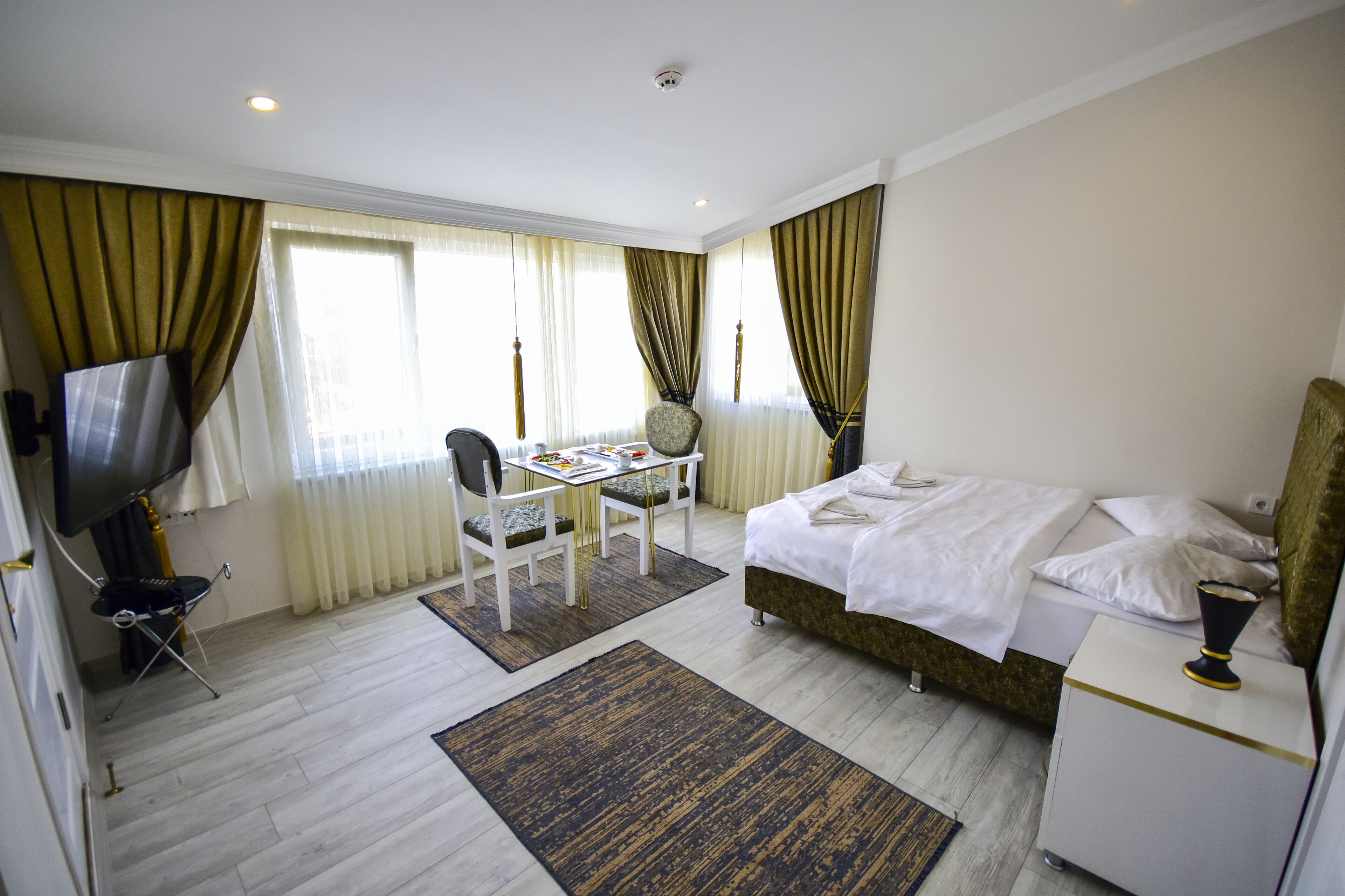 economy studio | premium bedding, down duvets, minibar, individually decorated