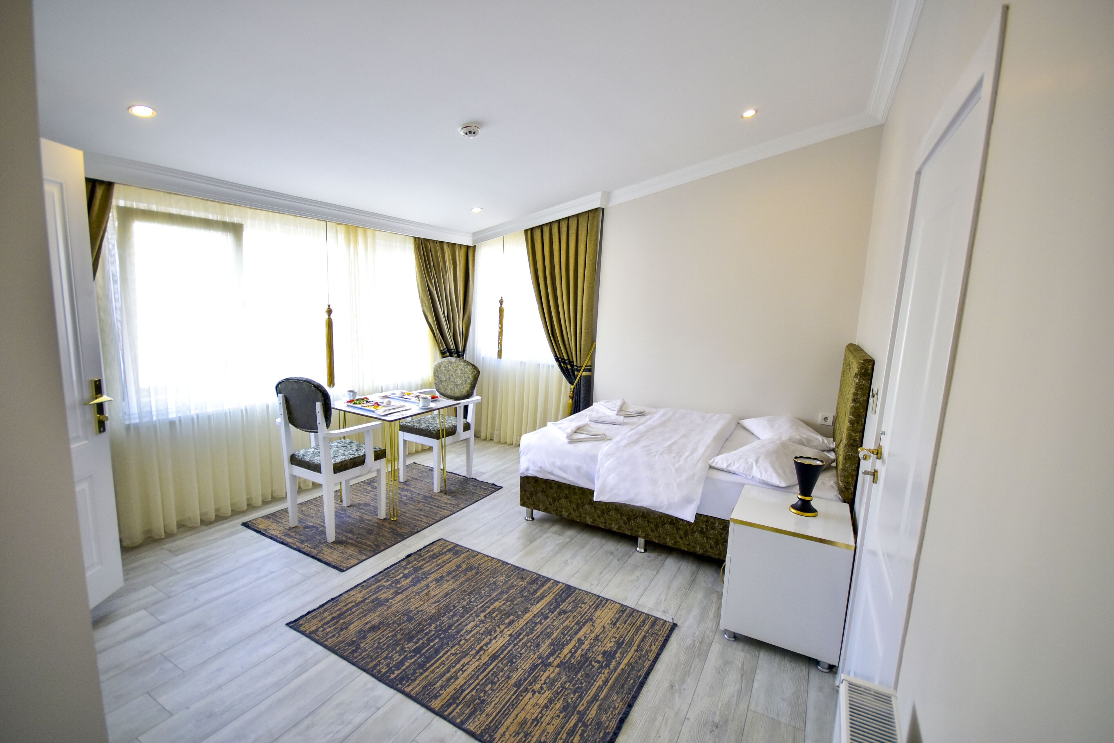 economy studio | premium bedding, down duvets, minibar, individually decorated