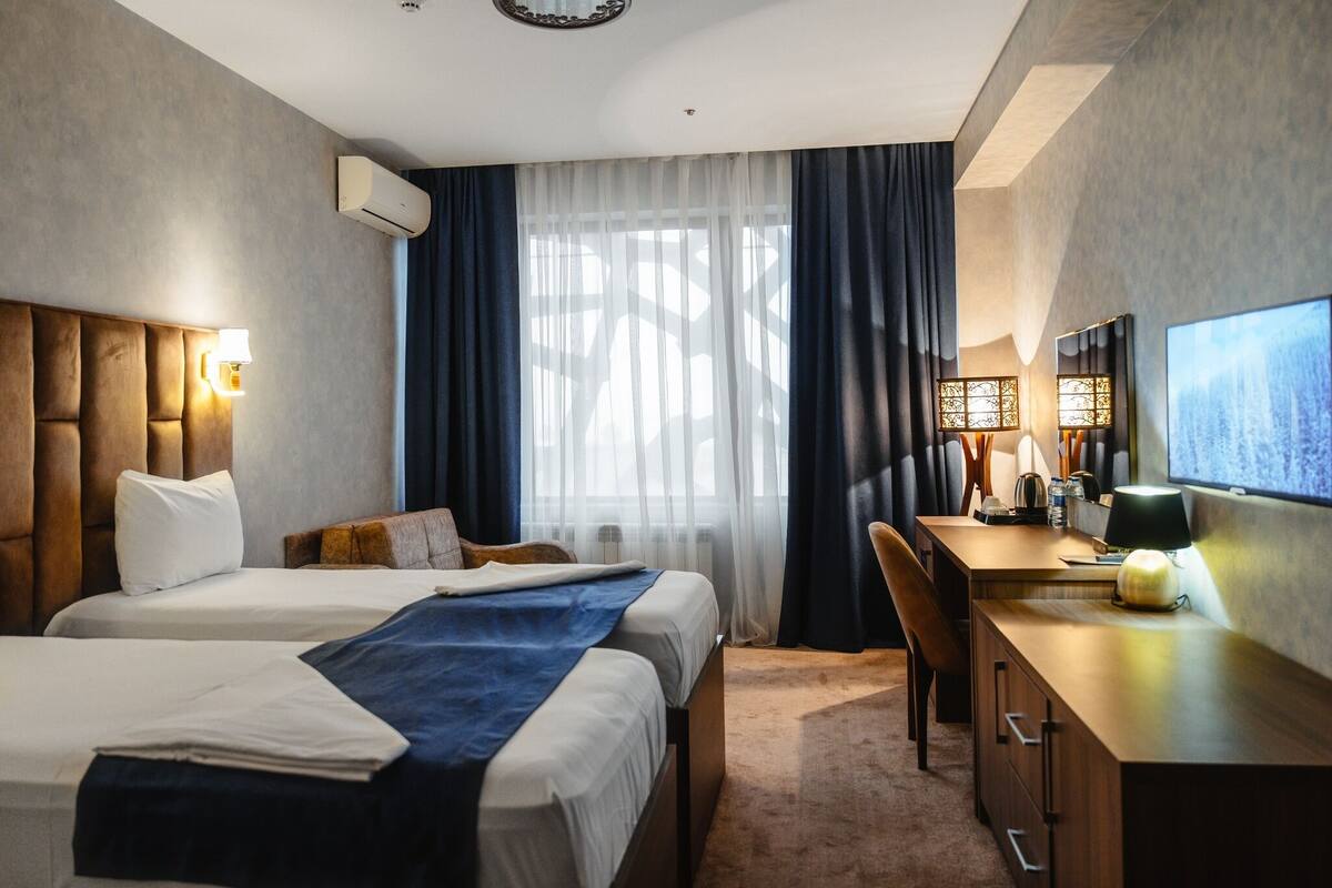 ห้องดีลักซ์ทวิน | เครื่องนอนระดับพรีเมียม, มินิบาร์, โต๊ะทำงาน, พื้นที่ทำงานแบบใช้แล็ปท็อป