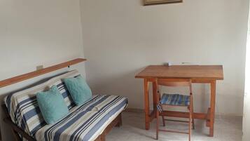 2 bedrooms, desk, travel crib, bed sheets