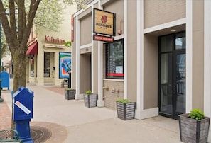 Shop and dine at Kilwin's and Panera's, two popular businesses with a rooftop bar.