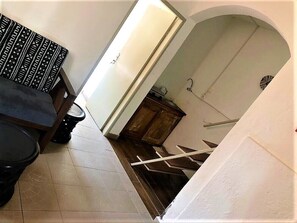 Interior - Modern studio decorated in African colors at the rear of a spacious villa. (Yaoundé)