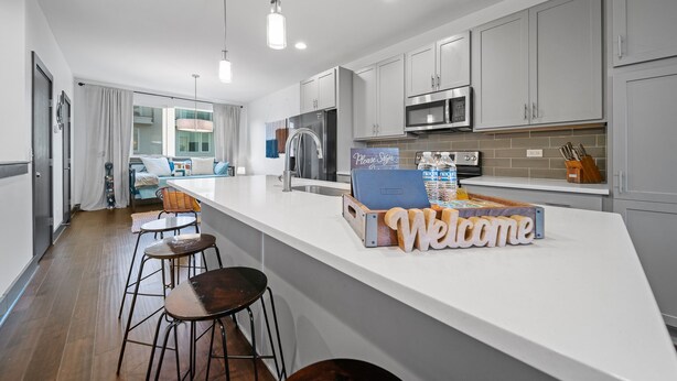 Maison mitoyenne, plusieurs lits, balcon, vue ville | Cuisine privée