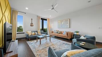 Townhome, Multiple Beds, Balcony, City View | Living area | 42-inch flat-screen TV with digital channels