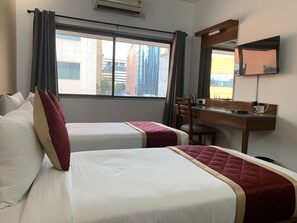 Premium Room, 1 Bedroom, Smoking, City View | Egyptian cotton sheets, premium bedding, down comforters - Lords MidTown Suites Bangalore (Bengaluru)