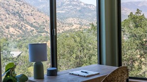 A room with a large window offering a view of a mountainous landscape. - Mtn View, Hot Tub, Open Kitchen, 10m to Sequoia (Three Rivers)