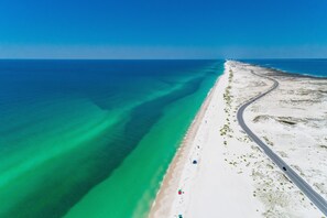 An aerial view of a beach with a road running parallel to the shore. - Luxurious, modernly decorated home close the beach (Navarre)