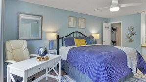 A bedroom with a bed, a desk, a chair, and a globe on the desk. - Enclosed Patio! Golf-Course View Near Branson Strip (Branson)