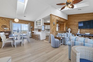 Smart TV, fireplace, books, video library