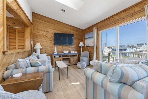 Smart TV, fireplace, books, video library