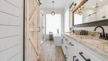 Bathtub, hair dryer, towels, soap