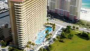 A high-rise hotel with multiple balconies, a swimming pool, and a beach view.