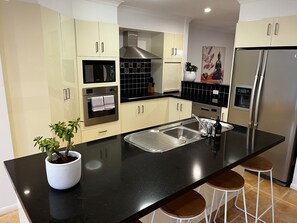 Private kitchen - Monte Vista - Beautifully Appointed Family Holiday Home (Broadbeach Waters)