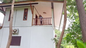 A two-story building with a balcony.