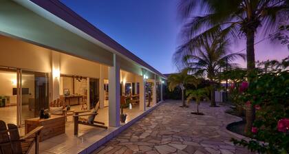 Centrally located 4 bedroom home with cozy pool and patio