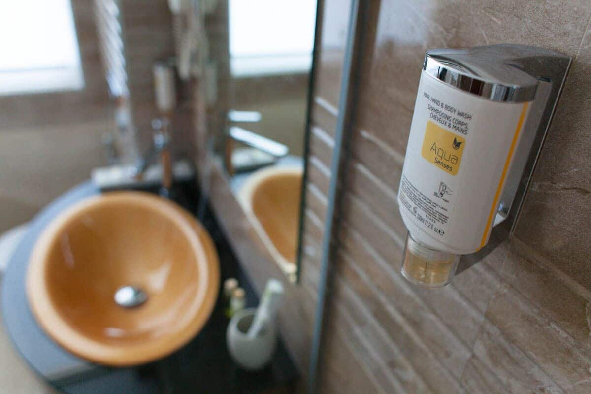 Shower, rainfall showerhead, hair dryer, towels