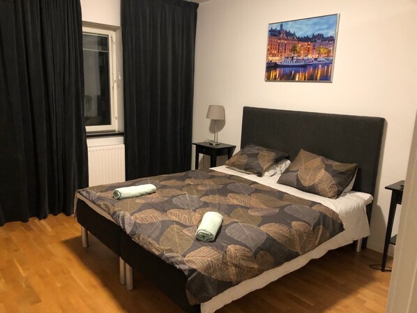 Apartamento, 2 camas de solteiro | 1 quarto, Wi-Fi de cortesia, roupa de cama