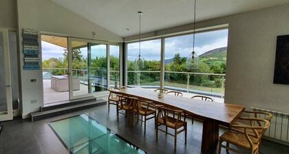Luxurious home with gym, bar & sauna, overlooking the Sugarloaf in Enniskerry.