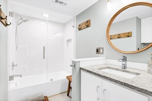 Combined shower/tub, hair dryer, towels, soap - Saltwater Haven - Beach Front, Ocean View (Surf City)