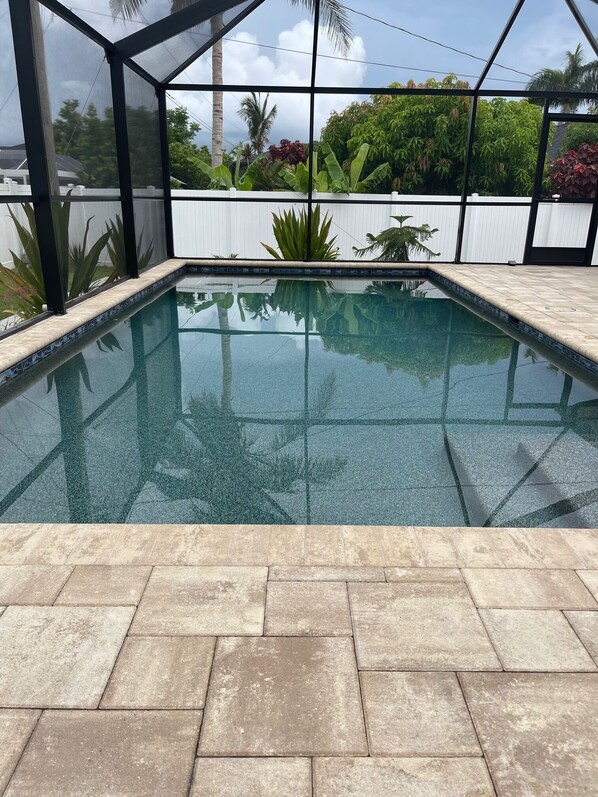 Outdoor pool, a heated pool - SW Florida Tranquility Heaven 3 bedroom house with new heated salt water pool (Cape Coral)