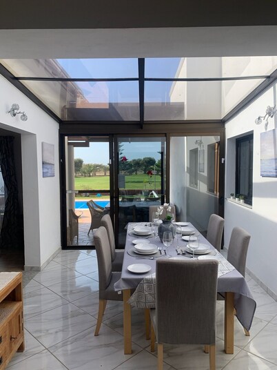 Lovely villa - all day sun, heated private pool with golf views, close to beach