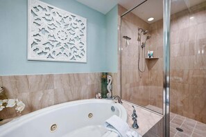 Combined shower/tub, hair dryer, towels, soap