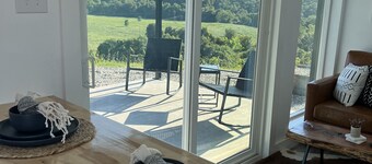 Cozy Shipping Container Home with River View near Eureka Springs