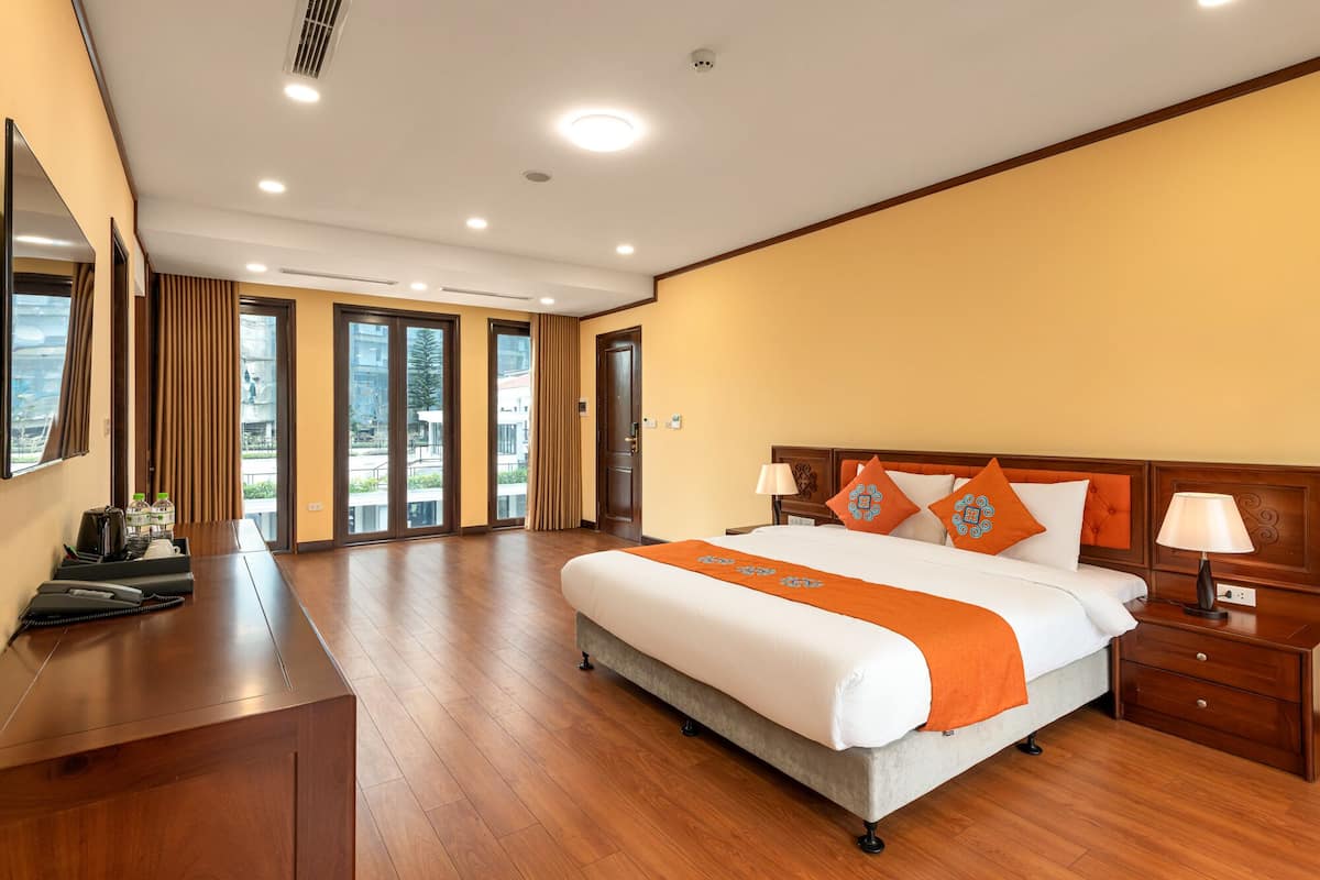 Habitación Deluxe con 1 cama matrimonial o 2 individuales | Ropa de cama hipoalergénica y minibar