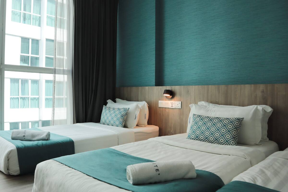 family room | 1 bedroom, in-room safe, desk, laptop workspace