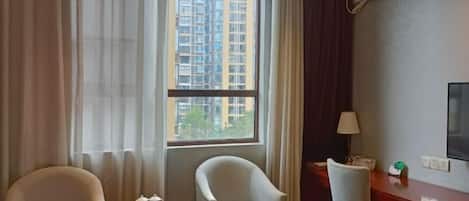Desk, blackout drapes, individually decorated, bed sheets