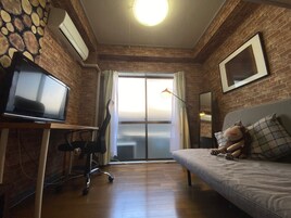 Economy Room | Blackout drapes, iron/ironing board, free WiFi