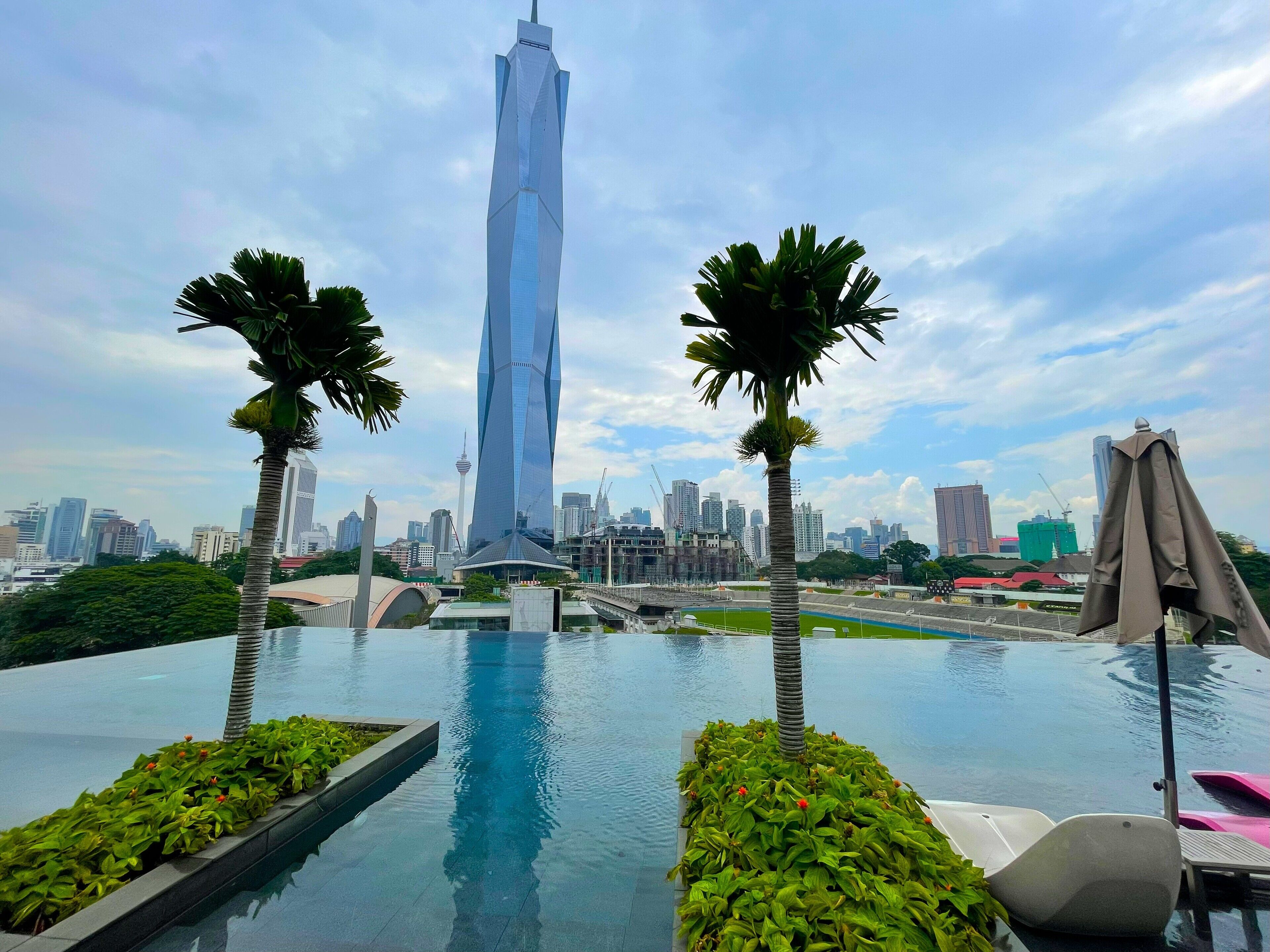 2 outdoor pools, open 8:00 AM to 10:00 PM, pool umbrellas