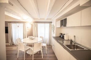 Master Suite Duplex With Two Bedrooms | Private kitchen | Fridge, microwave, oven, stovetop - Grand Hotel Duchi d'Aosta Apartments (Trieste)