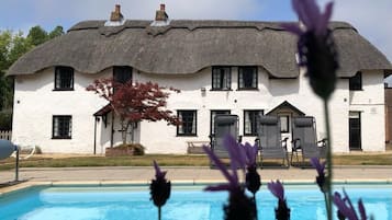 Luxury Cottage, Private Bathroom, Pool View (April Cottage) | Outdoor pool | Outdoor pool, a heated pool, pool loungers