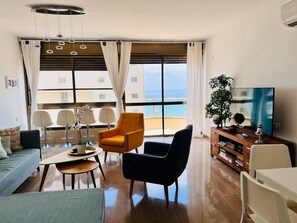 Comfort Apartment | Living area - Elegant Apt with Balcony & Sea View by FeelHome (Netanya)