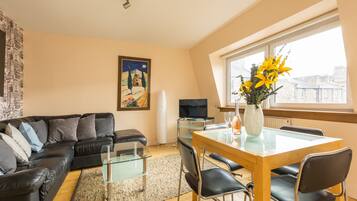 Deluxe-lejlighed - privat badeværelse - byudsigt | Lounge