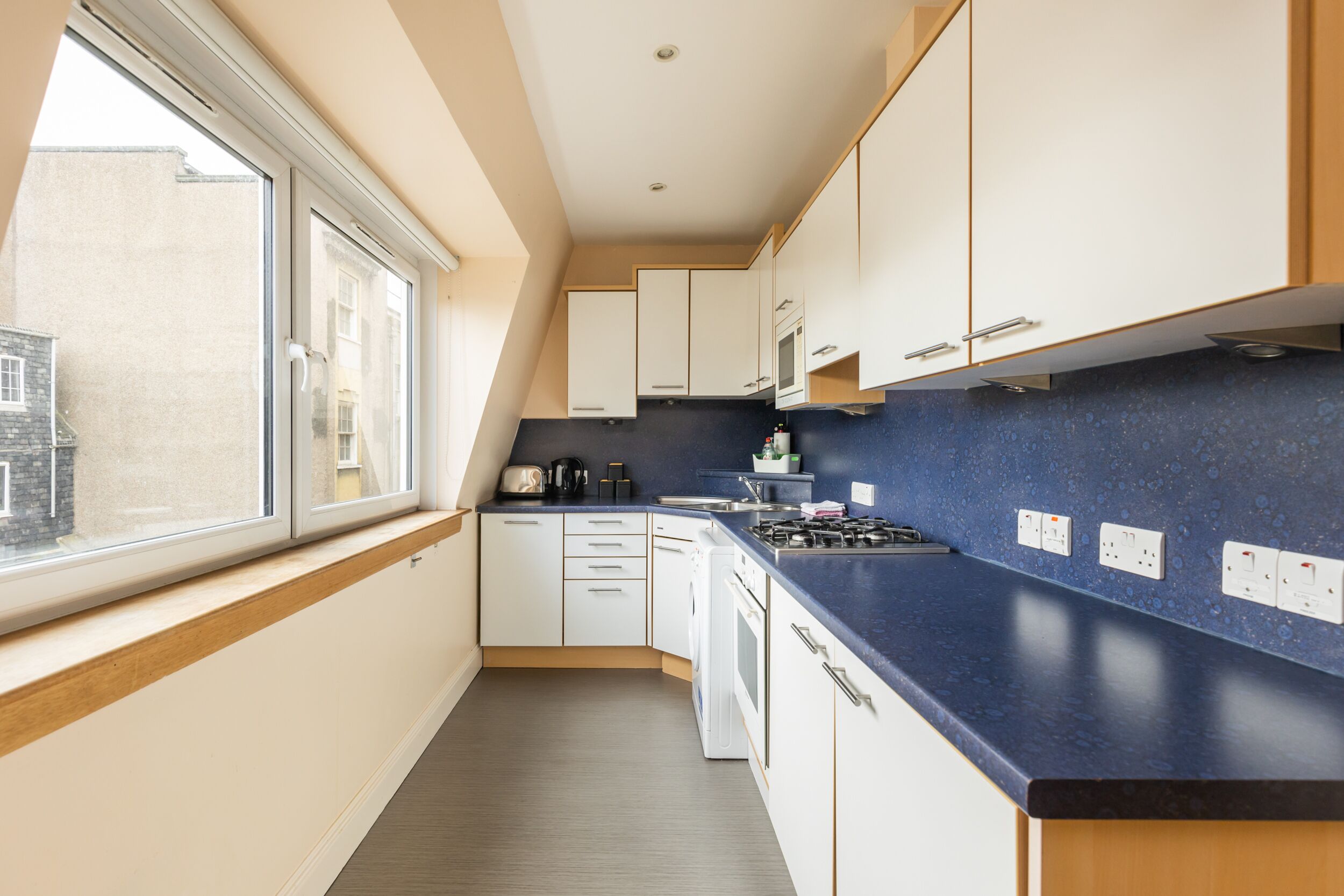 Departamento Deluxe, baño privado, vista a la ciudad | Cocina compartida