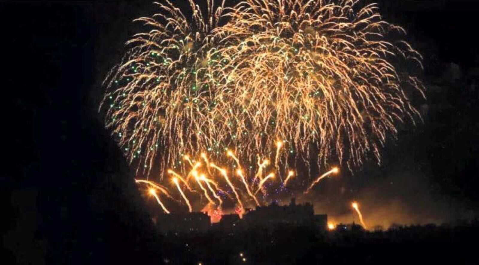 A night sky with fireworks.