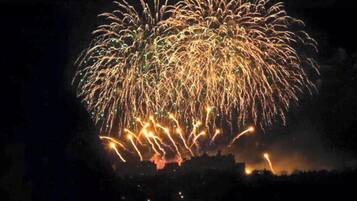 A night sky with fireworks.