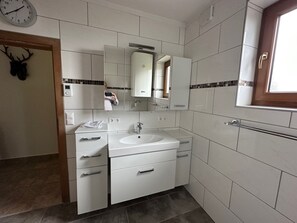 Douche, savon, papier toilette