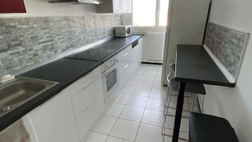 Réfrigérateur, four, plaque de cuisson, lave-vaisselle