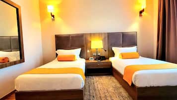 Twin Room | Minibar, in-room safe, desk, free WiFi