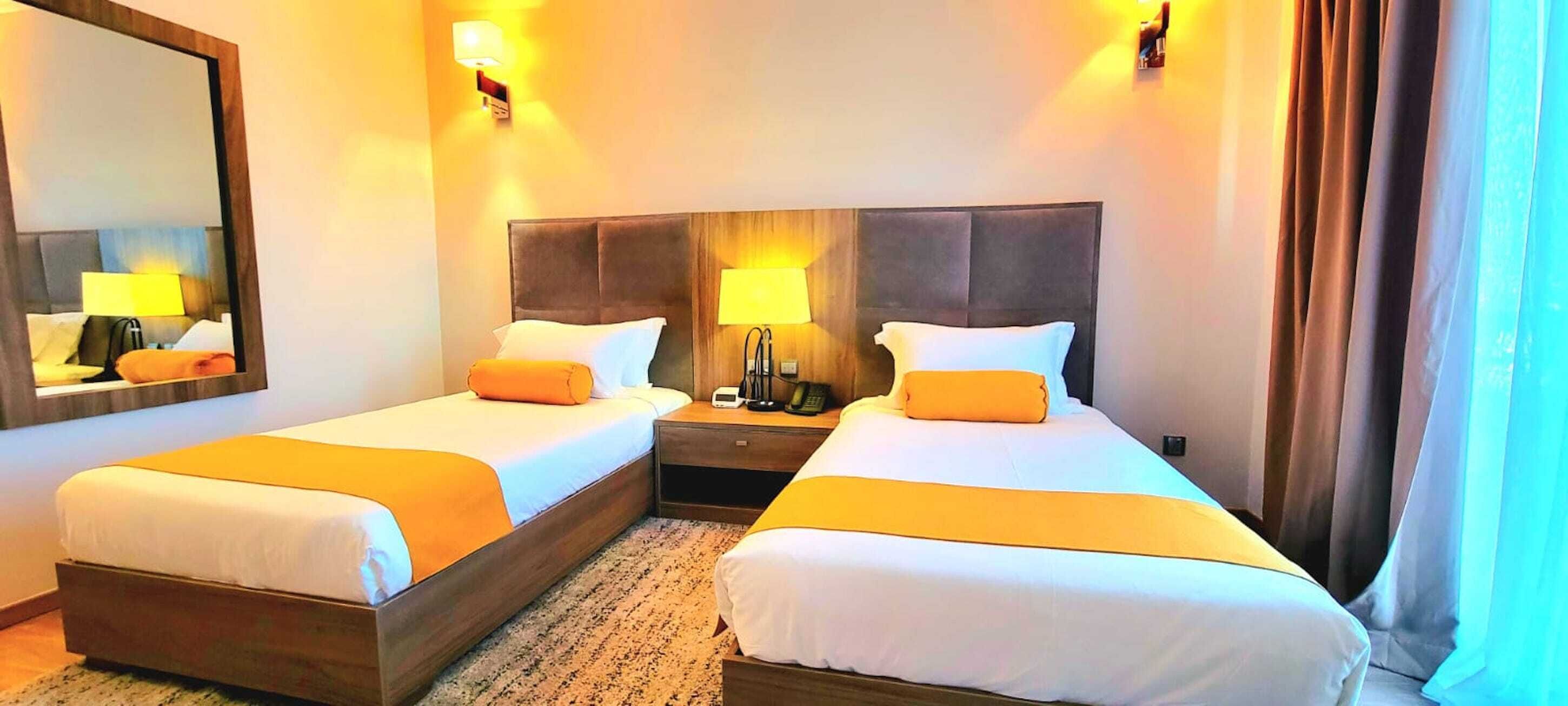 twin room | 1 bedroom, minibar, in-room safe, desk