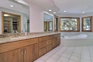 Bathtub, jetted bath, towels