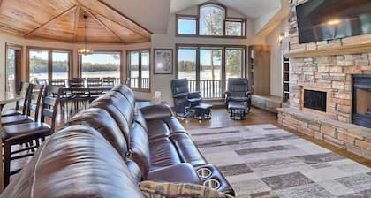 Private waterfront lake, sand beach, bar that seats 12, game room,