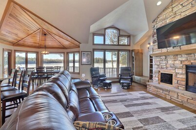 Private waterfront lake, sand beach, bar that seats 12, game room,