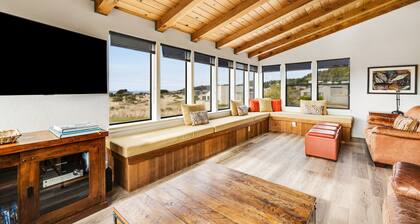 Dog-friendly home with private hot tub, ocean/meadow views & shared pools