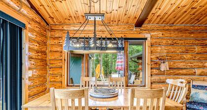 Lakefront log cabin on 3.5 acres with dock, gazebo & sunset views - dog-friendly