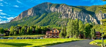 Mountain-view condo with hot tub - drive minutes to slopes & trails